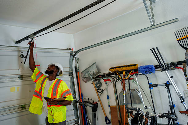 Professional Garage Door Panel Replacement technician working in Morrisonville, NY